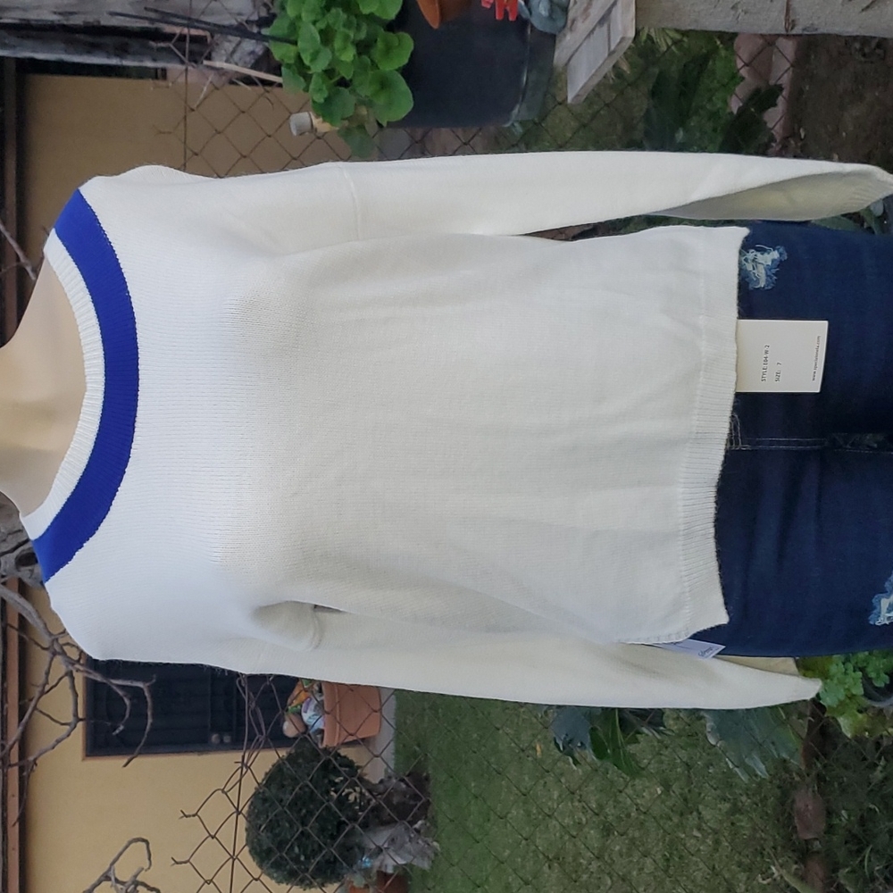 White with blue long sleeve shirt